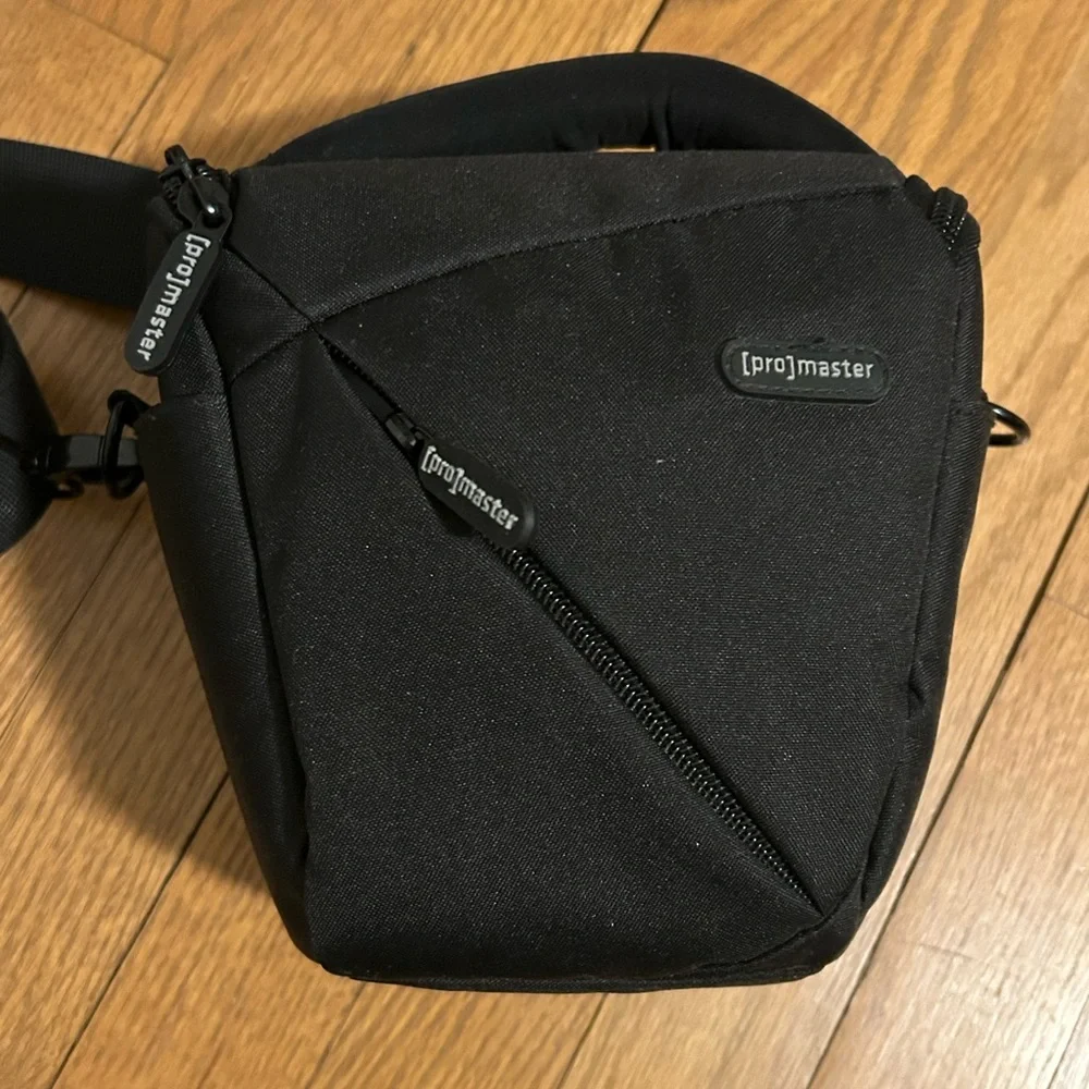 Black [pro]master camera bag. Water resistant. NWOT perfect condition!